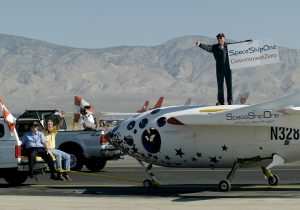 Paul Allen, Burt Rutan and Mike Melvill celebrate the flight of SpaceShipOne in Mojave, CA